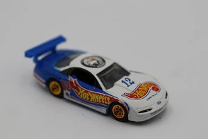 Oldsmobile Aurora GTS-1 #12 Robinson Racing llamas blancas/azules Hot Wheels - Imagen 1 de 3