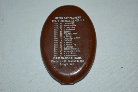 VINTAGE 1987 GREEN BAY PACKERS plastic Football coin purse Bank Bangor Wis. EUC Cover
