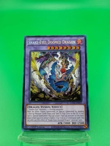 x1 Snake-Eyes Doomed Dragon - SUDA-DE035 - Secret Rare - 1. Auflage Yu-Gi-Oh! M - Bild 1 von 2