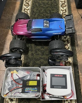 Traxxas E-Revo с батареями, зарядным устройством, приемником, приемником xtra и двигателем и т. д. - Изображение 1 из 4