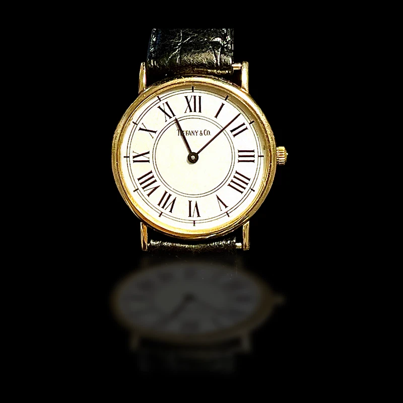 Reloj Tiffany & Co. Para Hombre Oro Amarillo 14K - Esfera Blanca Clásica con Números Romanos Foto 1 de 4