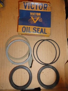 NORS 1956-60 BUICK 1957-65 CADILLAC REAR WHEEL SEALS - Picture 1 of 1