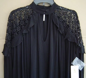 NWT $108 FREE PEOPLE Size XS LITTLE BIT OF LOVE RUFFLED TOP Black OB652064 - Picture 1 of 5