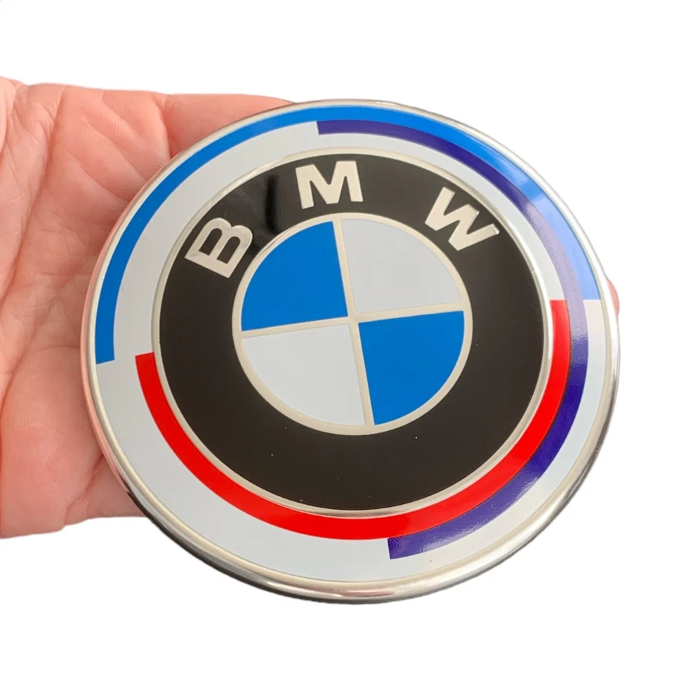 Capó delantero 82 mm para emblema insignia BMW 51148132375 blanco aniversario + ojales Foto 1 de 4