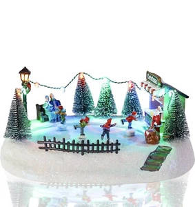 Christmas Village Houses, Santa Claus with Christmas tree and Rotating Kids S... - Picture 1 of 2