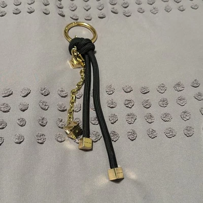 Bolso Michael Kors Charm Negro Dorado Foto 1 de 4