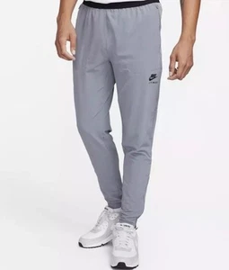 Nuevo Nike Air Max Pantalones Tejidos Absorbentes de Sudor Gris Fresco Para Hombre Talla Med FQ2207-065 - Imagen 1 de 3