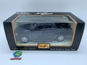 Maisto Ford Explorer Sport Trac, automodello scala 1:24, vintage (2413) - Foto 1 di 5