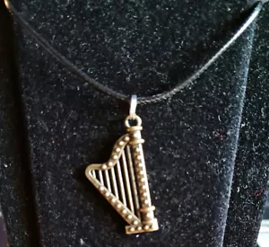 Bronze Colour Harp Charm Pendant Necklace. Black Braided Cord. 18". - Picture 1 of 1