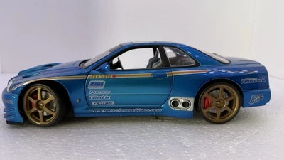 MUSCLE MACHINES 2000 NISSAN SKYLINE GTR GT-R 1/18 SCALE BLUE - READ - Image 1 of 4