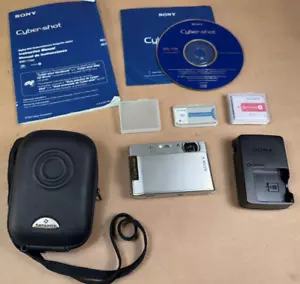 Sony Cyber-shot DSC-T100 8.1MP Digital Camera w Case,Charger, 2GB SD & 2 Battery - Picture 1 of 21