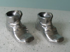 PAIR OF SMALL VINTAGE WHITE METAL BOOTS MATCH HOLDERS