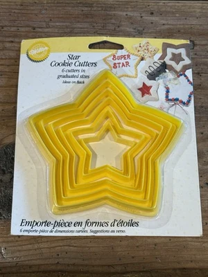 Cortadores de galletas Star 1994 vintage ~ 6 piezas graduadas ~ amarillo nuevo stock antiguo Foto 1 de 4