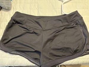 Pantalones cortos negros para mujer Nike talla grande laterales transparentes - Imagen 1 de 8