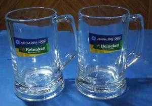 HEINEKEN BIER WERBUNG ATHEN OLYMPISCHE SPIELE 2004 Paar zwei 0,5 L GLASKRÜGE - Bild 1 von 7