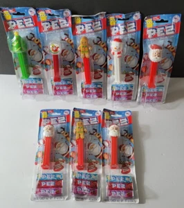 Lot of 8 Christmas Pez Dispensers in package/Seasonal Candy Flavor! (See Notes) - Picture 1 of 9