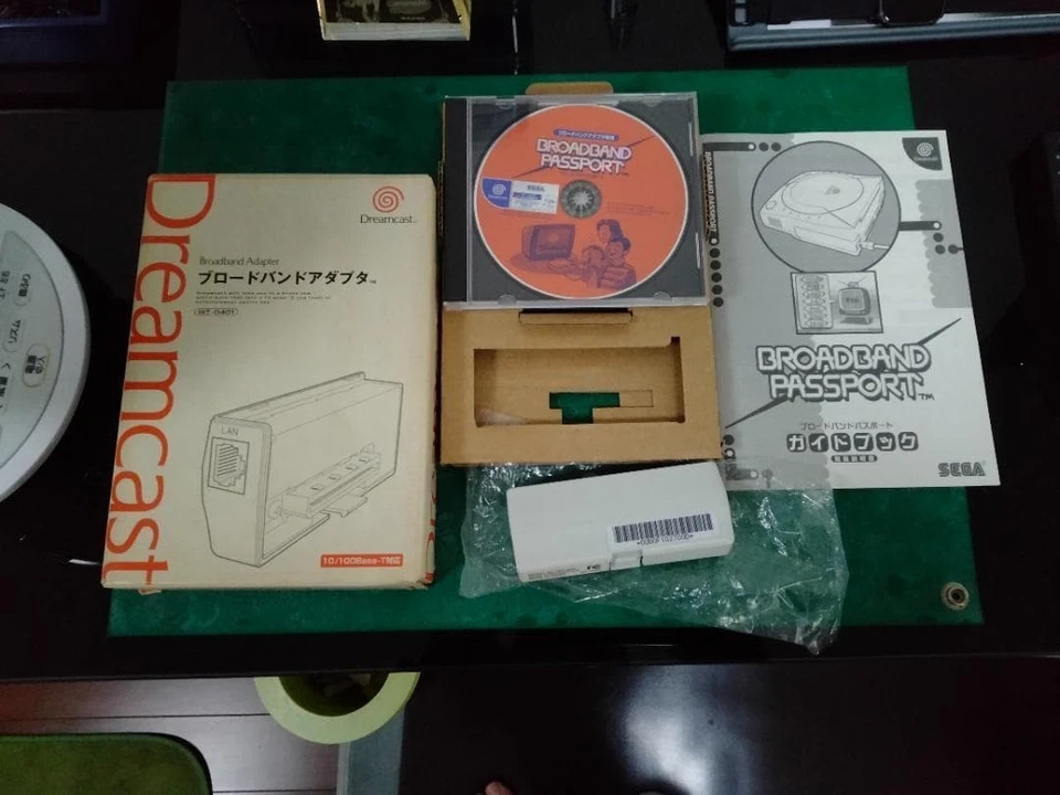 Adaptateur large bande officiel SEGA DreamCast HIT-0400 DC avec boîte CD manu... - Photo 1/1