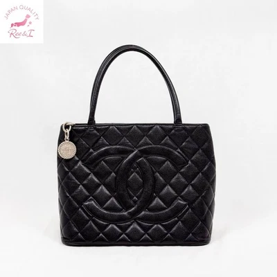 Bolso de Mano CHANEL Medallion A01804 Negro Piel de Caviar Plateado Herrajes B25062803 Foto 1 de 4