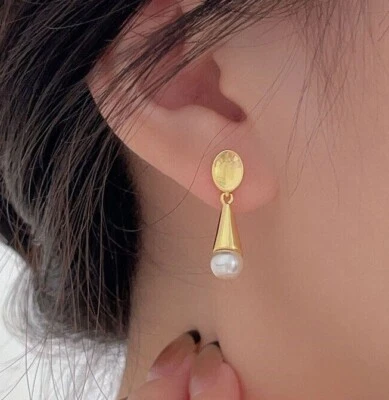 Aretes colgantes para mujer enchapados en oro amarillo de 18k con forma de gota de agua Foto 1 de 4