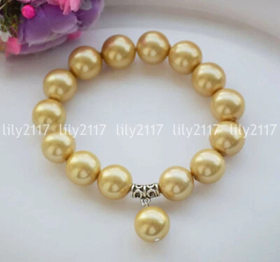 Brazalete elástico colgante perlas redondas 4 colores 8/10/12 mm Mar del Sur concha 8"" Foto 1 de 4