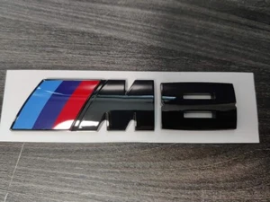 BMW M8 BLACK BADGE IN GLOSS BLACK, ADHESIVE, OEM+ ,For Rear boot - Picture 1 of 3