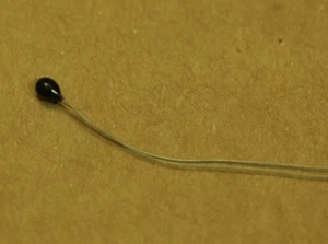 100PCS 197-103LAG Glass Discrete Thermistor Epoxy 10000 Ohm 10K Honeywell NTC - Picture 1 of 2