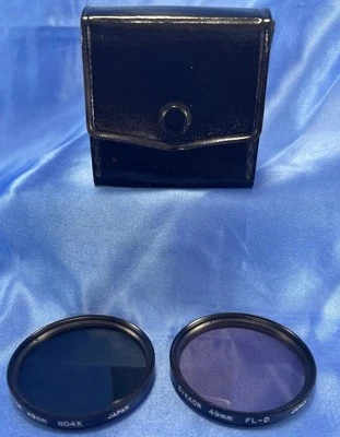 ZYKKOR 49mm TINTED NEUTRAL DENSITY CAMERA FILTERS ND4X  &  FL-D WITH CASE - Image 1 of 3