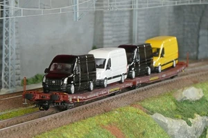 Trix 24428 Wagons plats articulés Laads 800B, Transwaggon, chargé 4 fourgons VW - Picture 1 of 9