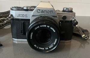 Vintage Canon AE-1 35mm Film Camera w/ Canon FD 50mm 1:1.8 Lens (Lever Issues) - Picture 1 of 8