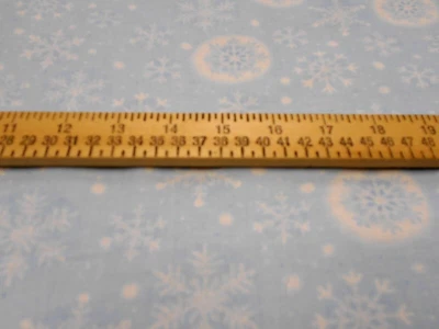 Copos de nieve de 1 yarda sobre tela azul de Navidad  Foto 1 de 2