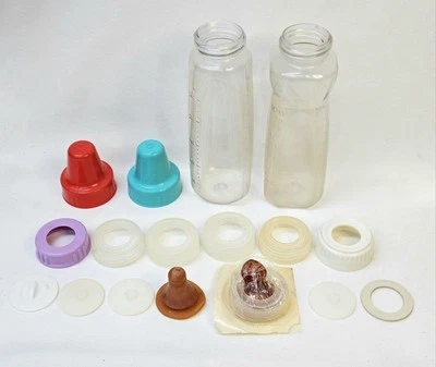 Vintage Baby Bottles With Nipples,Tops, Rings and Cap Covers NUK - Image 1 of 4