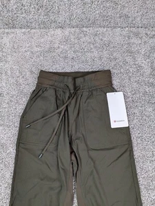 Lululemon Pants Womens 2 Olive Green Beyond the Studio Crop Track NWT W6BJBS - Picture 1 of 16