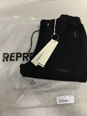 PANTALONES DEPORTIVOS CON CREMALLERA EN BLANCO REPRESENTAT  Foto 1 de 4