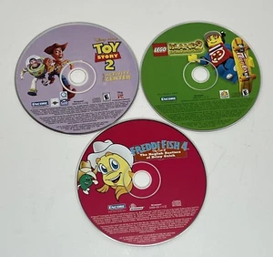 3 Kids CD-ROM PC Games Toy Story 2 Freddi Fish 4 Lego Island 2 Action Adventure - Imagen 1 de 4