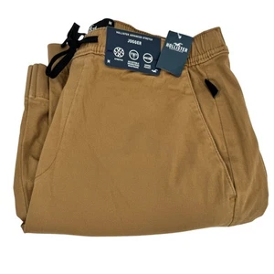 Hollister Pantalone Jogger Uomo Medium Tan Advanced Elasticizzato Coastal + Tasche NUOVO - Foto 1 di 10