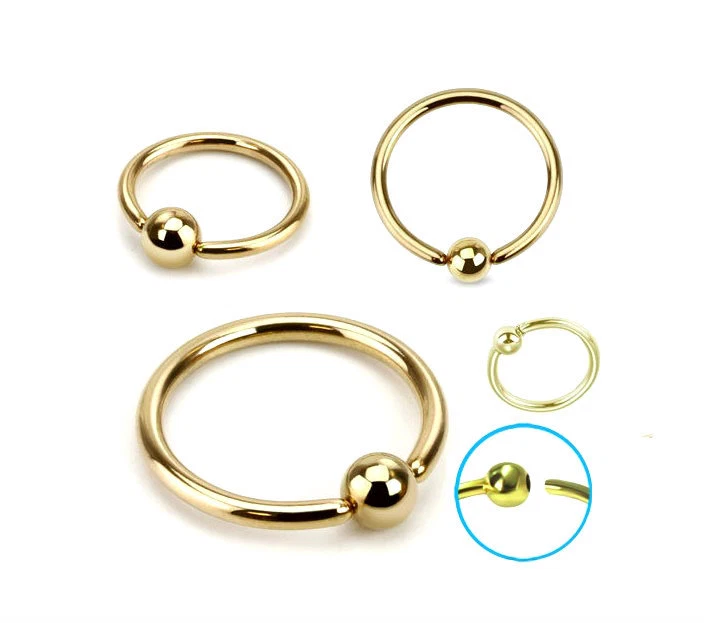 Gold titanium captive bead ring hoop earring cartilage tragus helix piercing  - Image 1 of 1