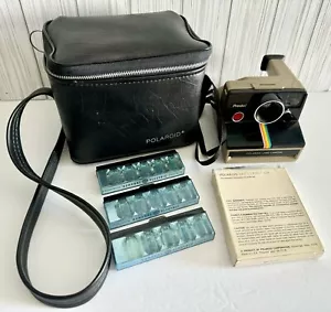 Polaroid Presto! Cámara terrestre vintage con bombillas de flash, película y bolsa de transporte vintage - Imagen 1 de 12