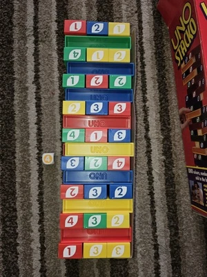 Uno Stacko Board Game Ultimate Stacking Game - Image 1 of 4