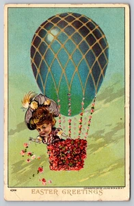 Woman On Blue Egg-Shaped Flower Hot Air Balloon Dropping Flowers Easter Postcard - Picture 1 of 2