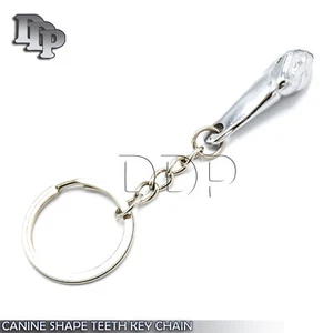 Llavero de dientes con forma canina de 1 pieza - Imagen 1 de 3