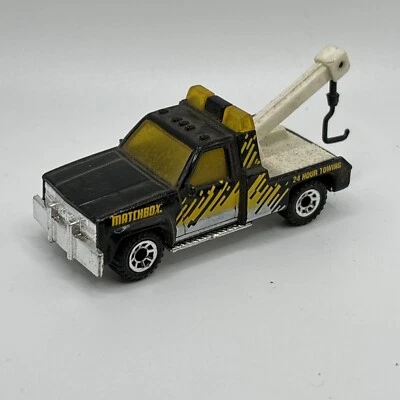 Matchbox 1987 GMC Wrecker 1.72 loose Yellow & Black 24 Hour Towing - Image 1 of 4