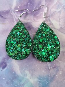 Handmade green glitter teardrop earrings on silver plated hooks