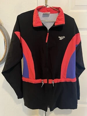 Chaqueta cortavientos vintage Reebok adulto mediana negra púrpura exterior hombre años 90 Foto 1 de 4