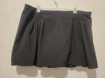 Falda corta de tenis/golf Lucy Tech negra talla M ropa deportiva para mujer Foto 1 de 4