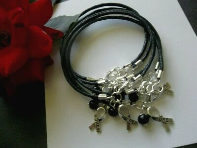 6 - MELANOMA  CANCER AWARENESS BLACK  'HOPE' CHARM BRACELETS/WAXED COTTON CORD  - Image 1 of 4