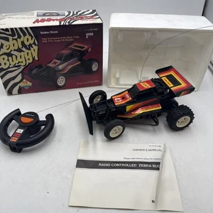 Coche de radiocontrol Zebra Buggy Radio Shack 60-4065 completo en caja excelente estado de colección - Imagen 1 de 24