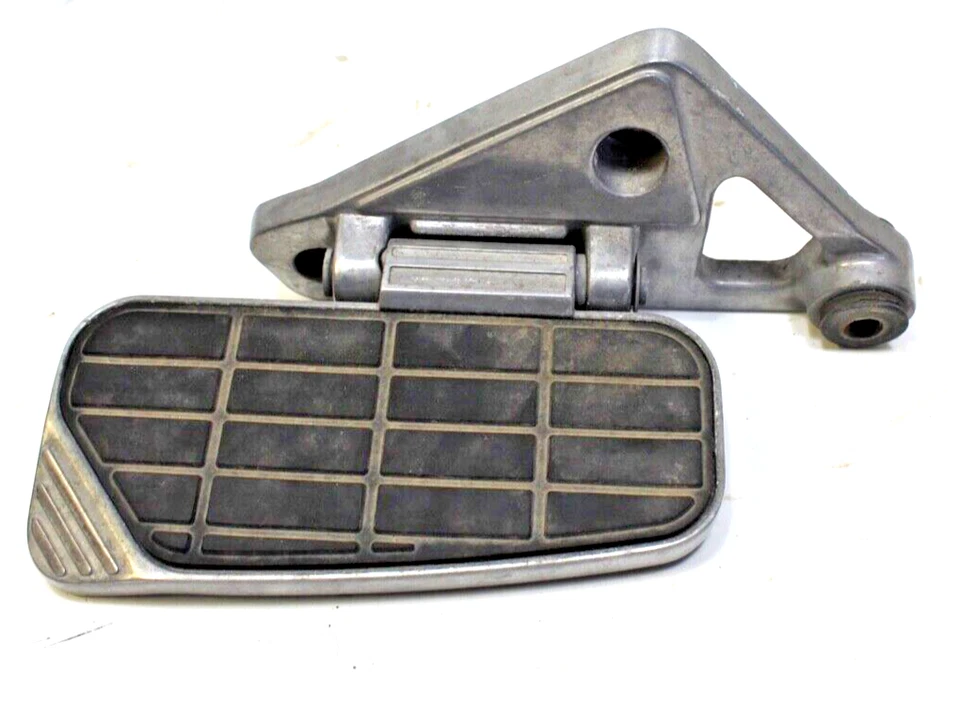 1991 Kawasaki Voyager XII левая задняя опора для ног в сборе от оригинального производителя No 34028-1231 - Изображение 1 из 1