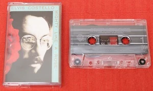 ELVIS COSTELLO - UK CASSETTE TAPE - MIGHTY LIKE A ROSE - Picture 1 of 6