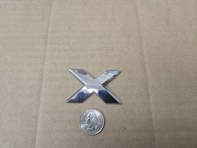 Nissan OEM 2005-2012 XTerra X Individual Letter Emblem Badge Logo 93494 EA000 - Image 1 of 2