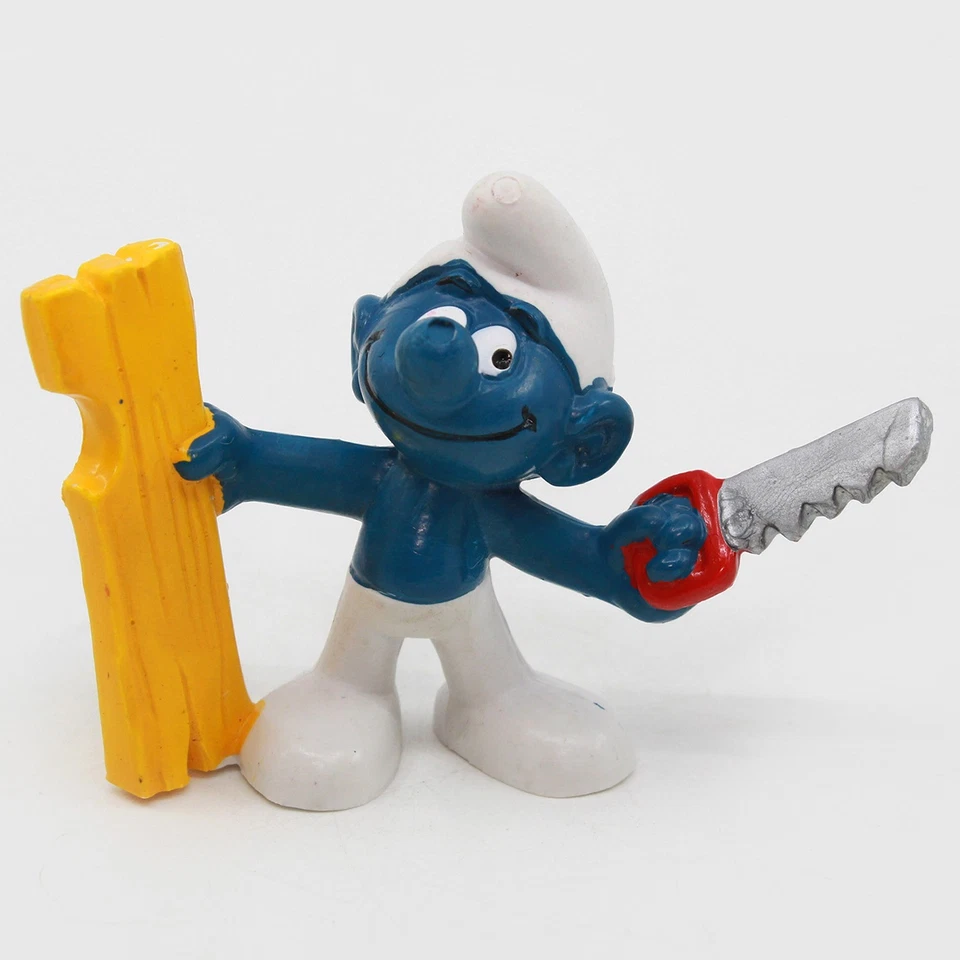 Carpintero SMURF con madera y sierra - Figura PVC Peyo Schleich Pitufos de colección Foto 1 de 4